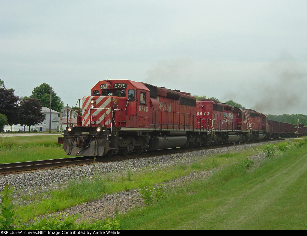 Three growling EMD 645s power #486